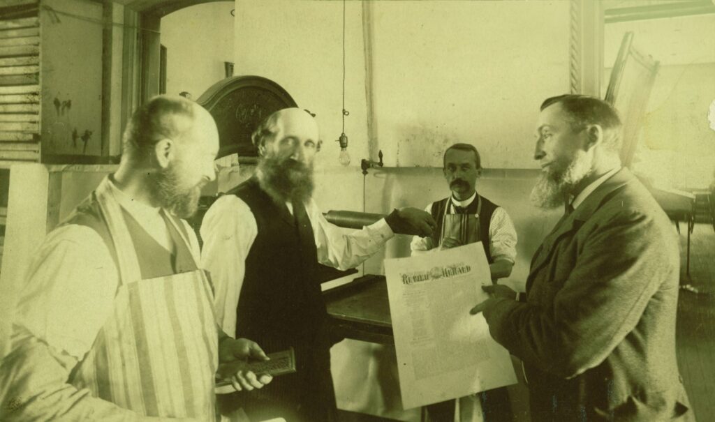 printing press with 3 guys